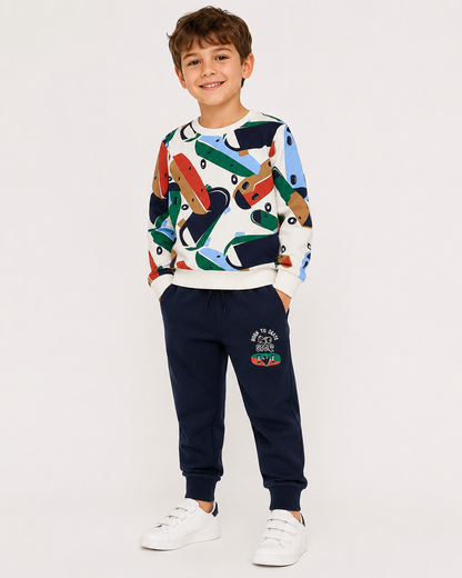 Tuta bambino Sarabanda con fantasia skateboard – Panna e blu